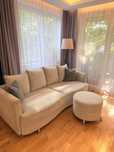 Stylowy zestaw: Sofa z funkcja spania + puf - komfort i elegancja!