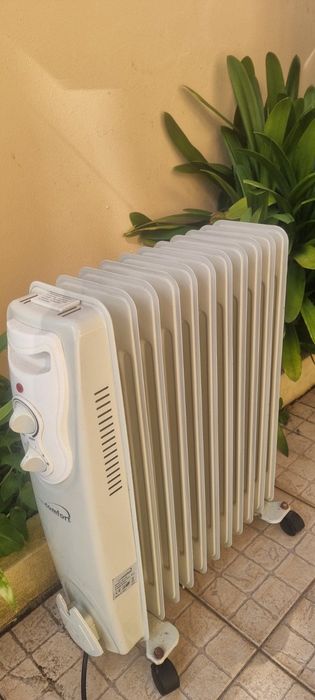 Aquecedor a óleo com rodas