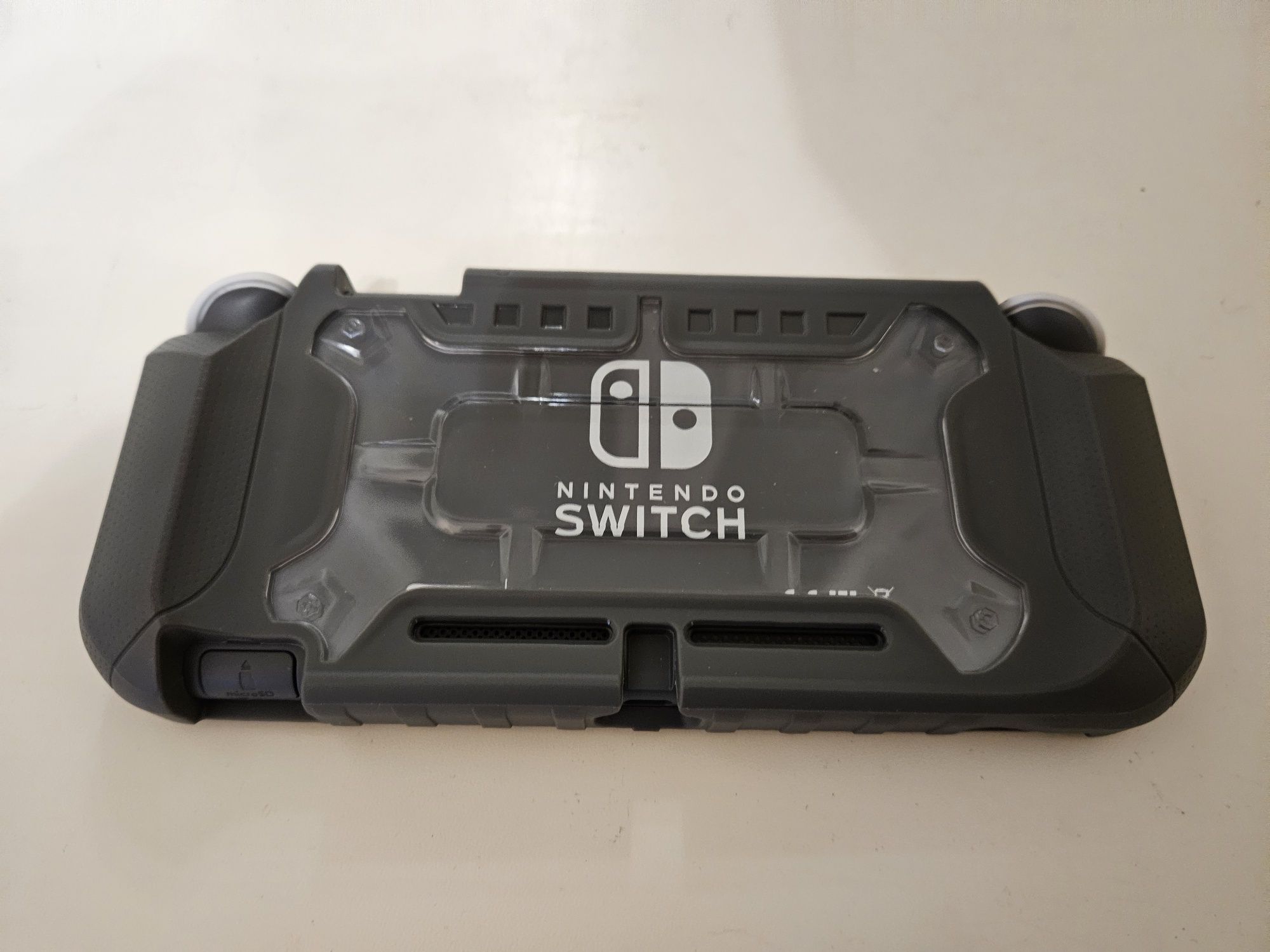 Nintendo Switch Light + SD 128gb.