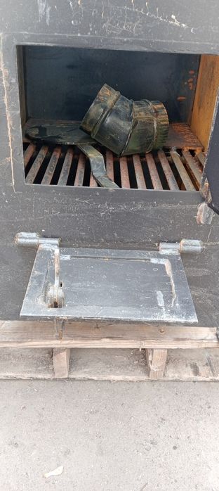 Печь- буржуйка фирмы ICARE с теплообменником.