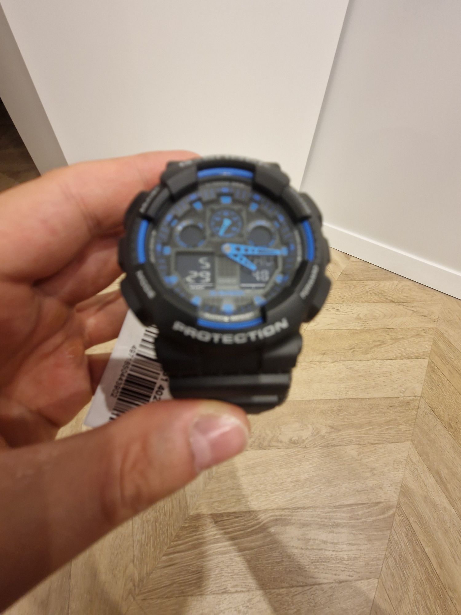 Zegarek sportowy CASIO G-Shock Original GA-100-1A2ER Czarno-niebieski