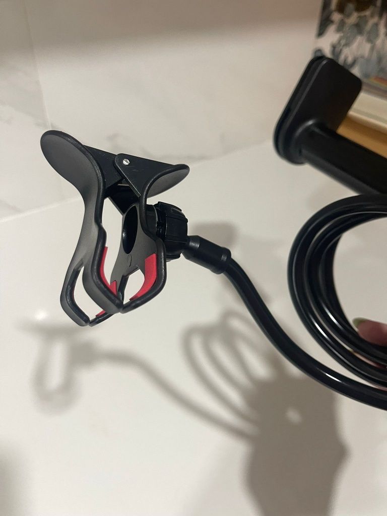 Suporte tipo gancho para telemóveis