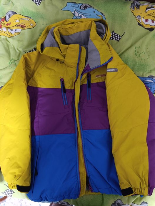 Зимова фірмова куртка на ріст 146-152