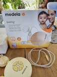 Medela swing laktator elektryczny automatyczny butelka smoczek