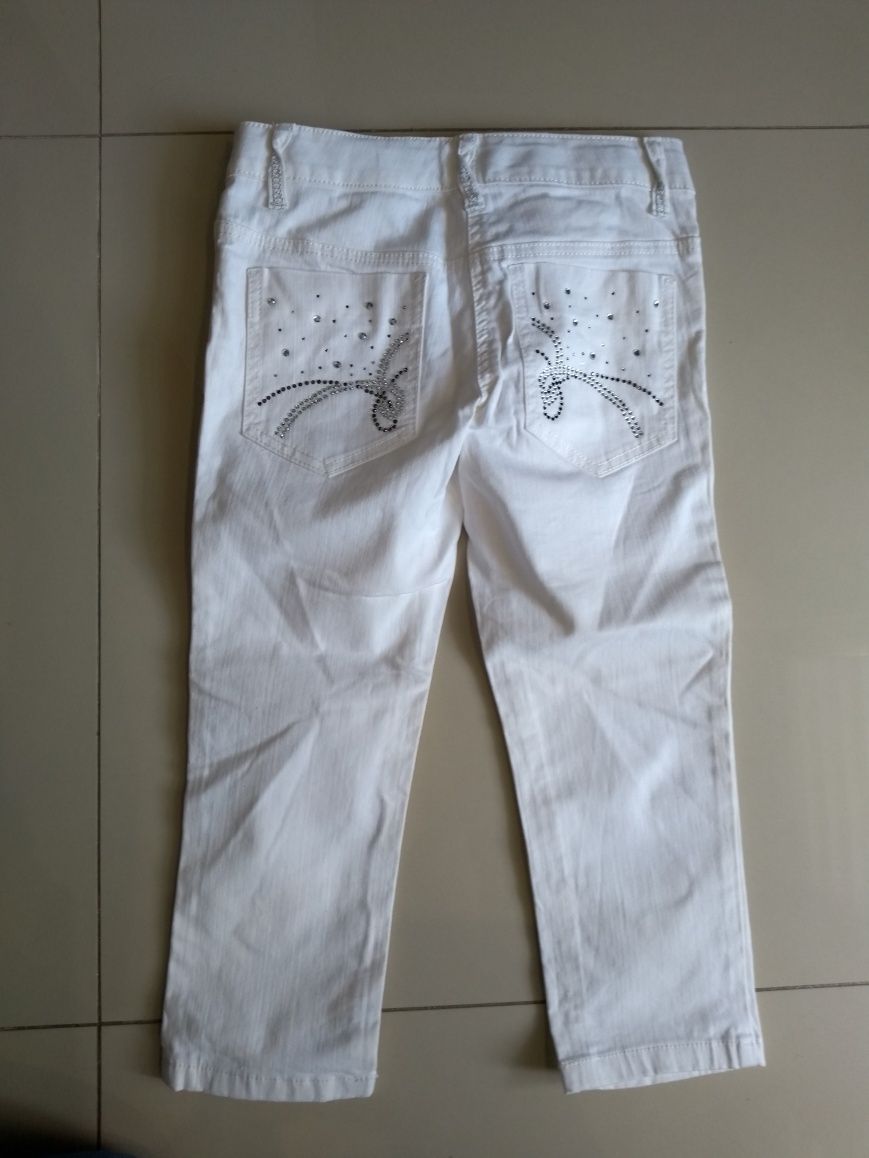 Spodnie dziewczęce białe Next 140cm 9-10 lat jeans nogawka 3/4