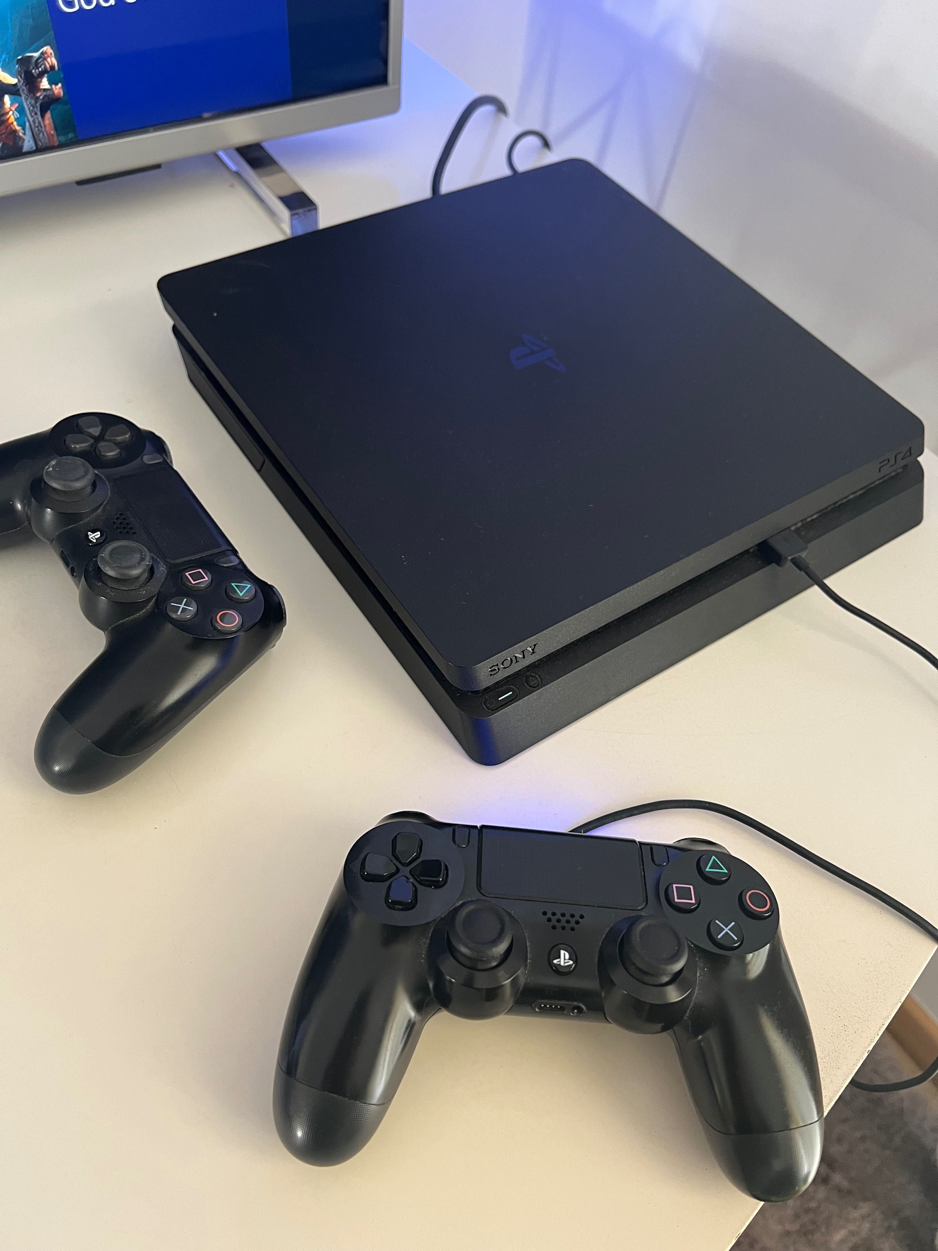 Ps4 slim 500GB, 2 comandos e conta psn com mais de 60 jogos digitais