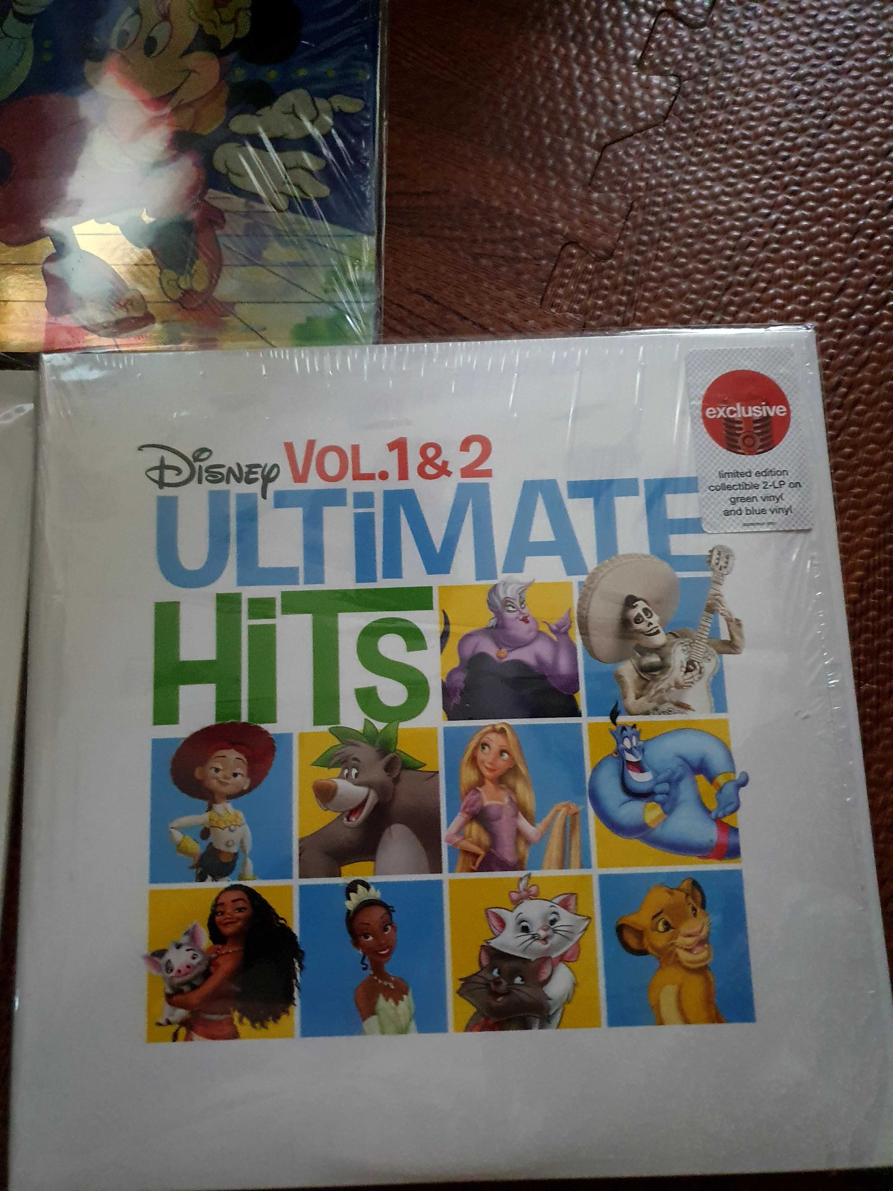 Ultimate hits 2lps 
Mickey Mouse 

Earth One Am