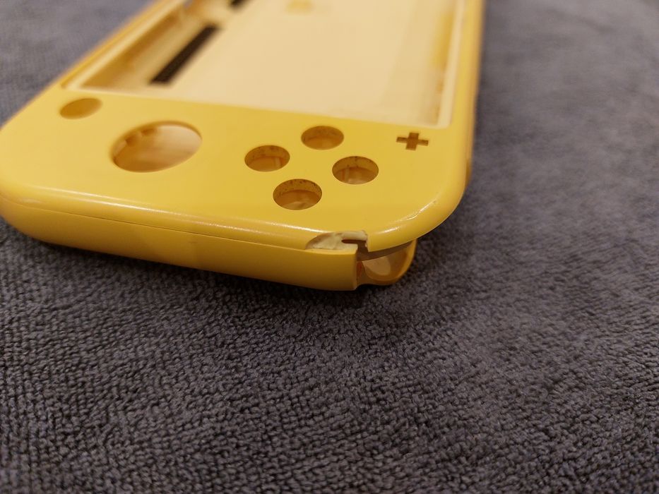 Shell original Nintendo Switch Lite Amarela