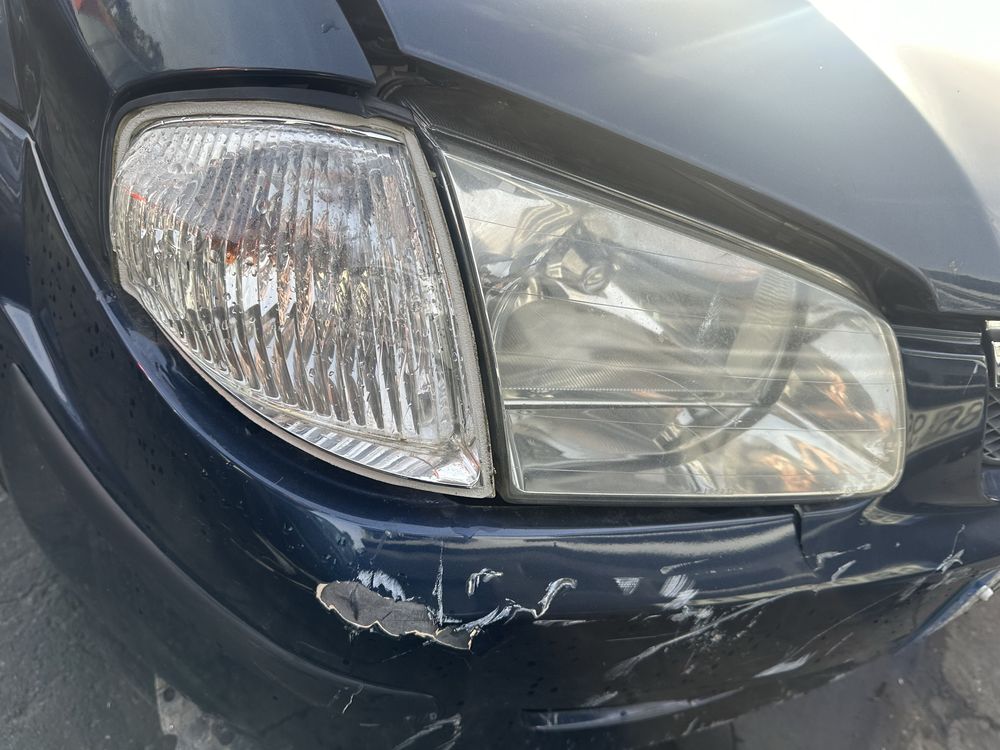 Otica e pisca direito /esquerdo mazda  323 F ano 2000