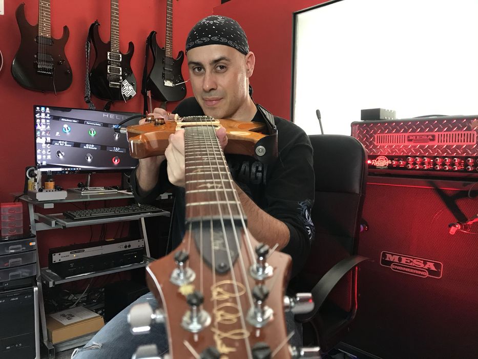 Aulas de guitarra presenciais ou online