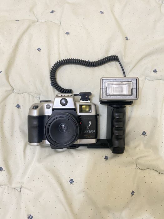 Vendo máquina fotográfica Nokina NK3030 de rolo