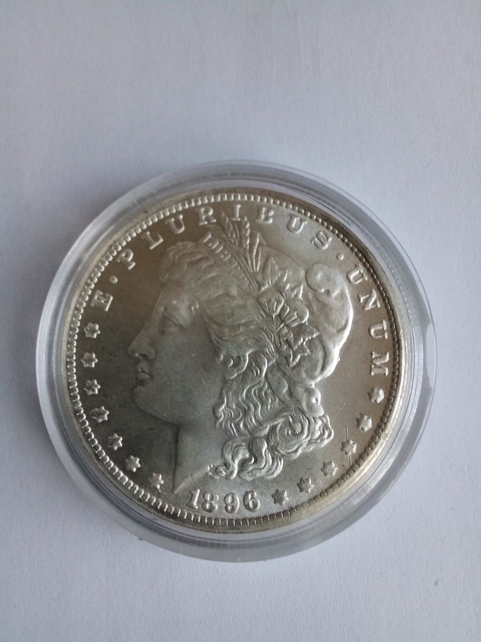 Срібний долар 1896 року.