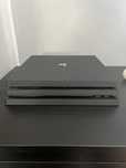 PlayStation 4 Pro + Akcesoria + Gry