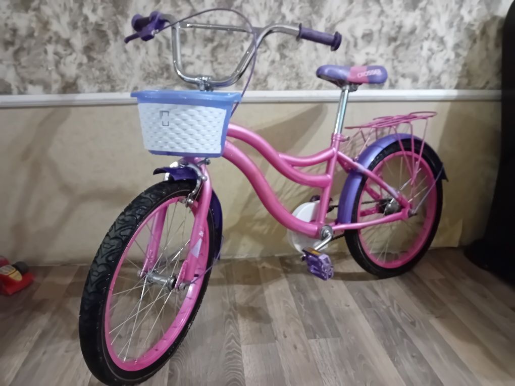 дитячий рожевий велосипед