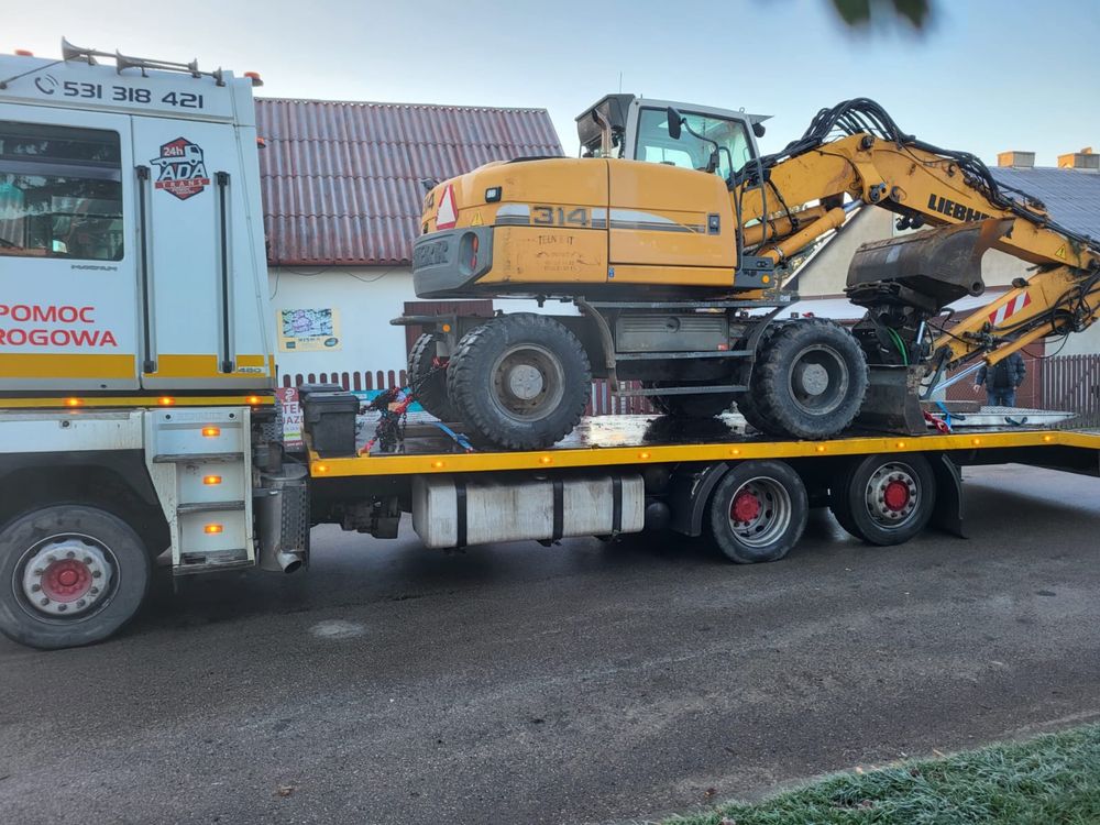 transport do 15ton  maszyn bud.sprzetu rolniczego i aut POMOC DROGOWA