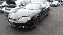 34284 Hyundai coupe II Tiburon na części 2.0 GLS 143 km G4GC skrzynia J318309678 lakier EB