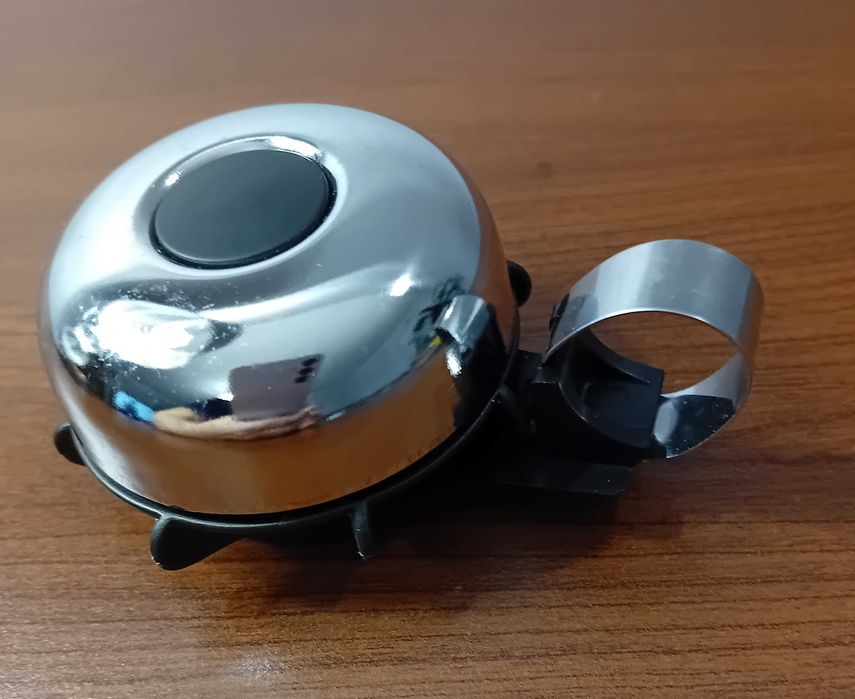 Dzwonek rowerowy firmy Spanninga / Made in Holland / metalowy,srebrny.