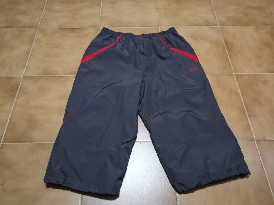 Calções corsários da Reebok camihada