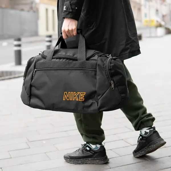 Стильная спортивная сумка Nike ORANJE текстильная чорная для спортзала