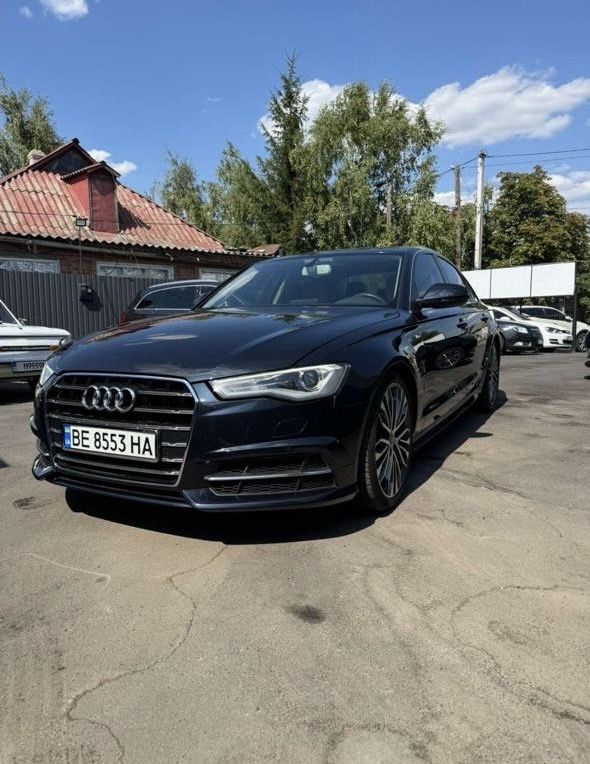 Машина Audi a6 c7