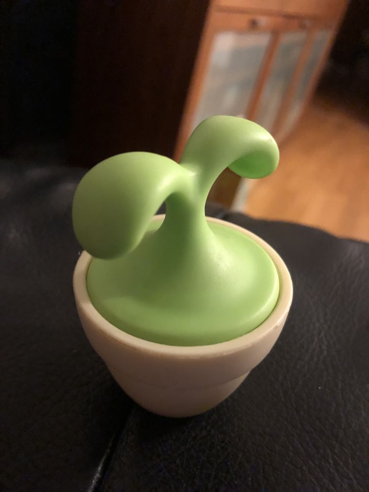 Massageador em forma de planta