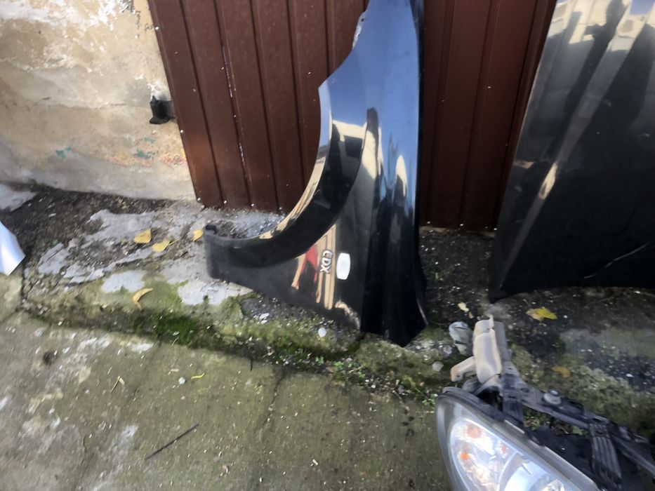 Передній Бампер Chevrolet Lacetti  комплектний перід чорний