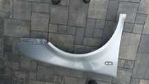 Vw golf 4 iv blotnik przedni prawy srebrny la7w