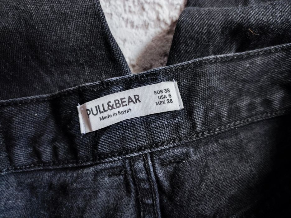 Spodnie z wysokim stanem szerokiemu nogawki