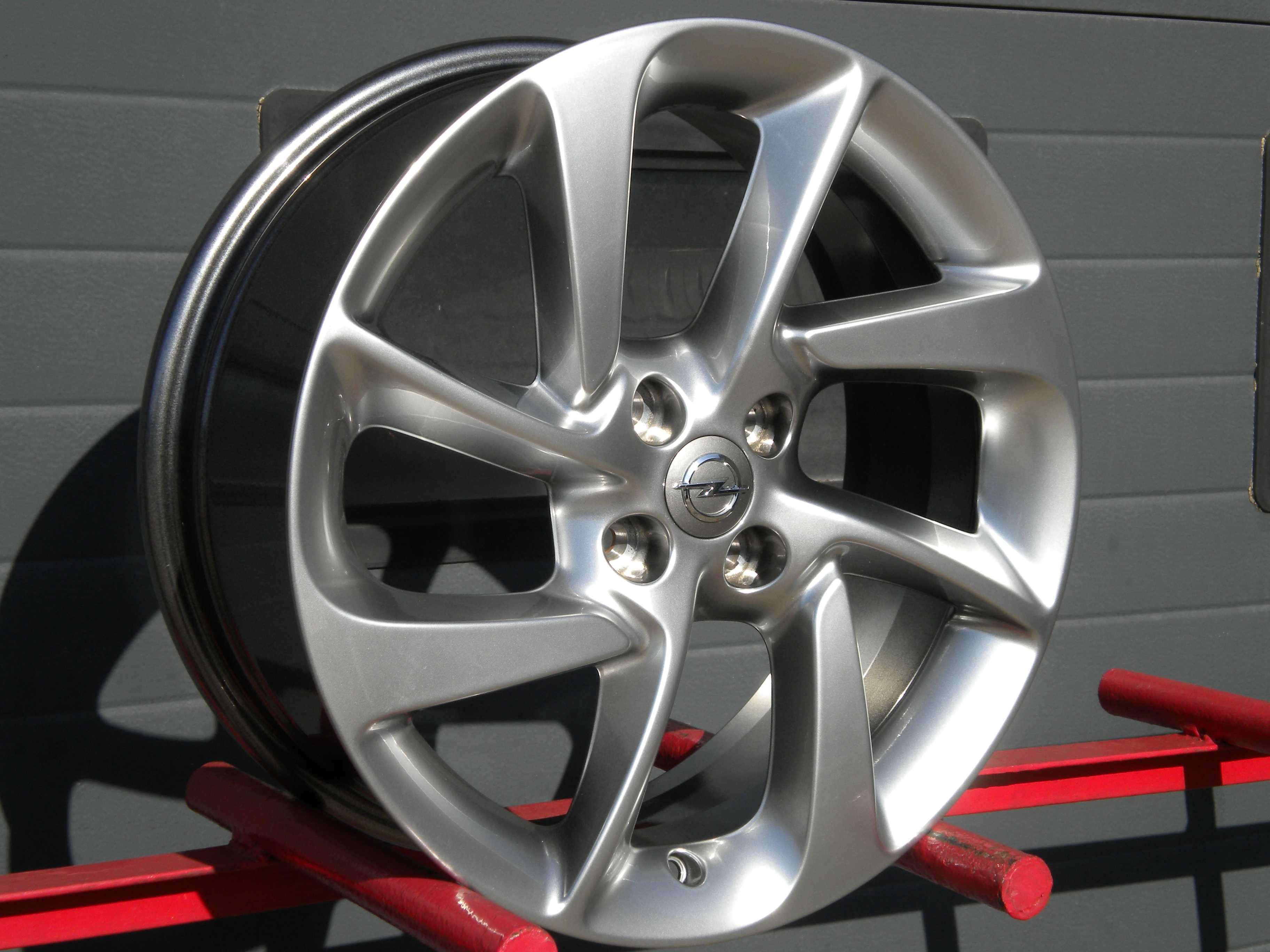 Nowe felgi aluminiowe fabryczne 17 4x100 Opel Adam Corsa D E