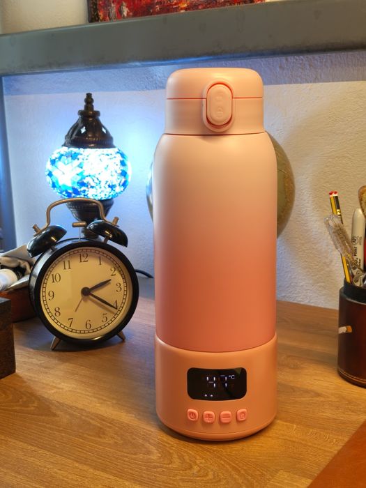 Garrafa com aquecimento para bebés