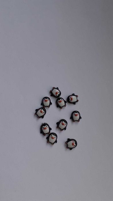 Pinguins em resina miniatura