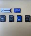 2 memory stick Pro Duo+ 4 adaptadores SD (SanDisk e Sony)