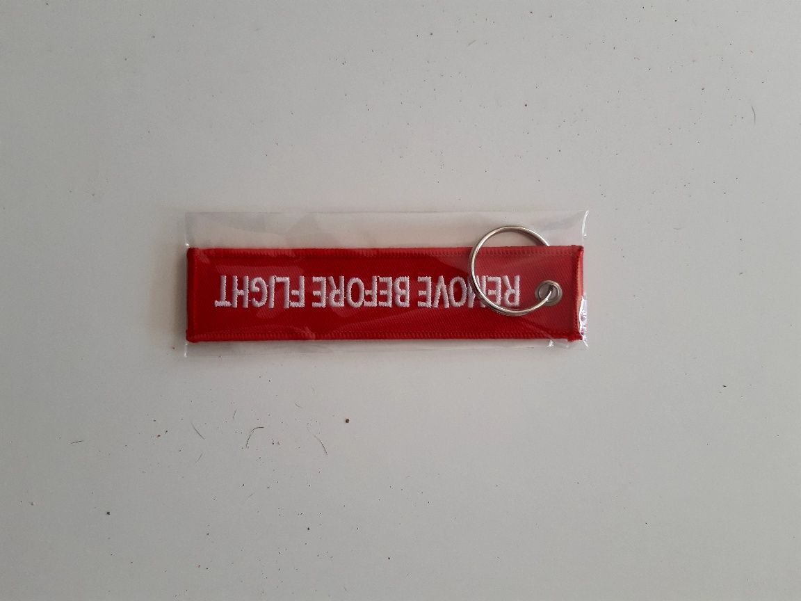 Porta chaves Remove before flight. NOVO