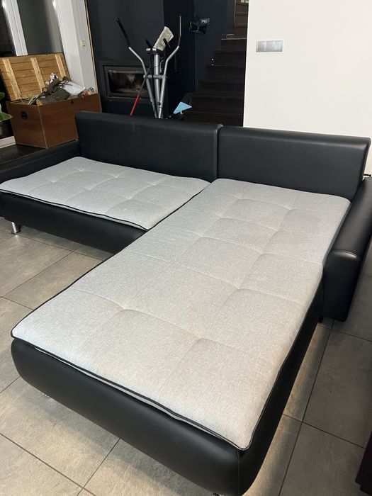 Narożnik z funkcją spania i pojemnikiem na pościel