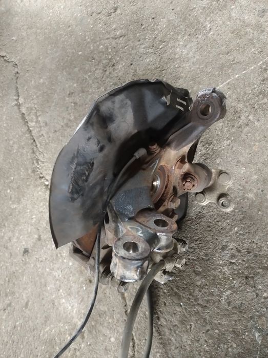 Zwrotnica Tarcza Zacisk Toyota Yaris Cross Hybryda Wysyłka