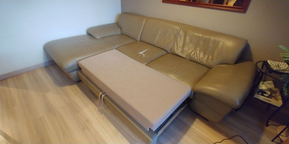 Rogówka oliwkowa z funkcją spania i pojemnikiem na pościel.