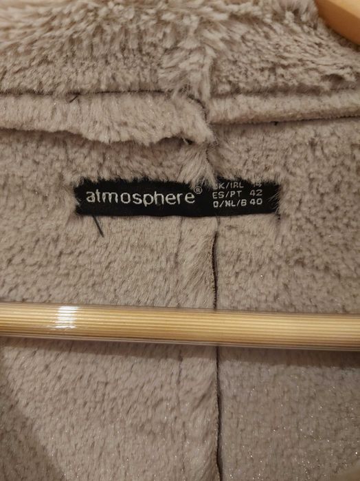 Casaco castanho com pêlo