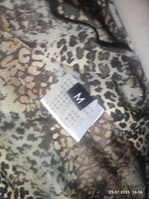 Жилетка шкіряна, хутро коза