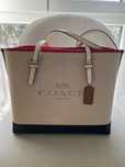 Mala Coach com dust bag