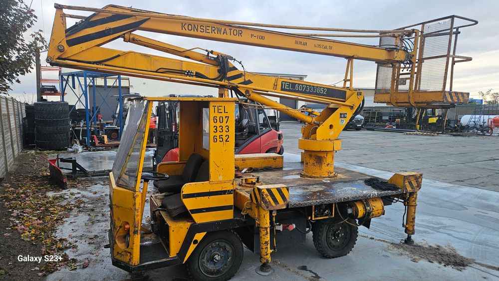 PODNOŚNIK KOSZOWY P100 na wózku platformowym