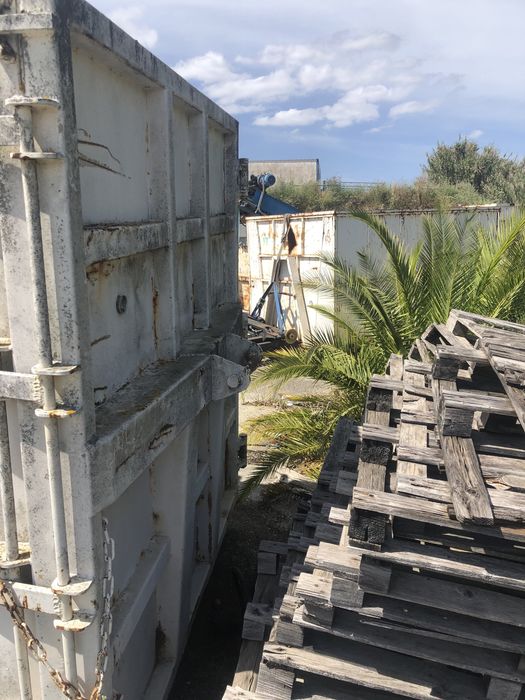 Contentor compactador