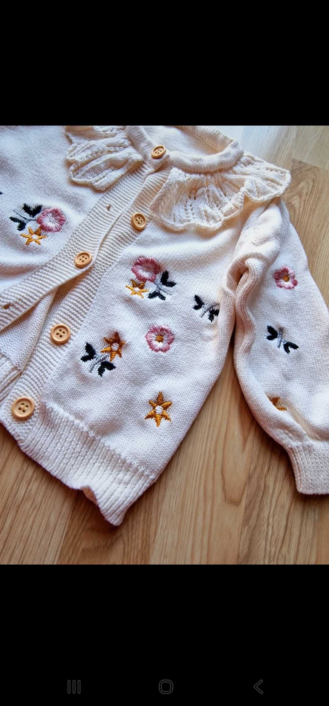Casaco com bordados