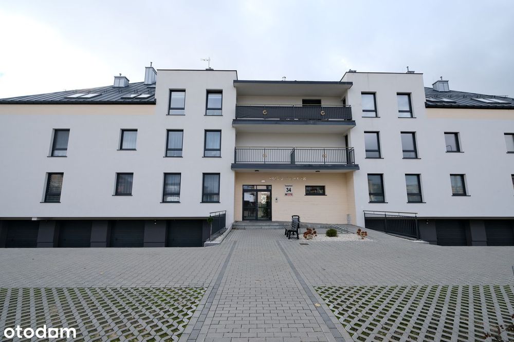 2-pokojowe mieszkanie plus 58 m2 poddasza - nowy blok w centrum Moniek