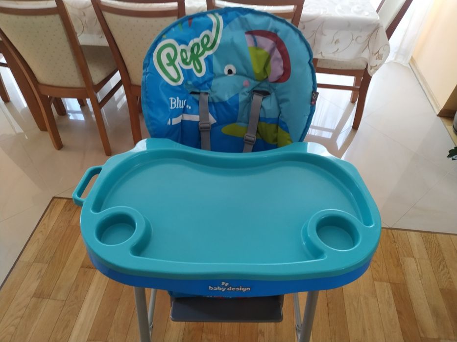 Krzesełko ze stoliczkiem do karmienia Baby design super stan