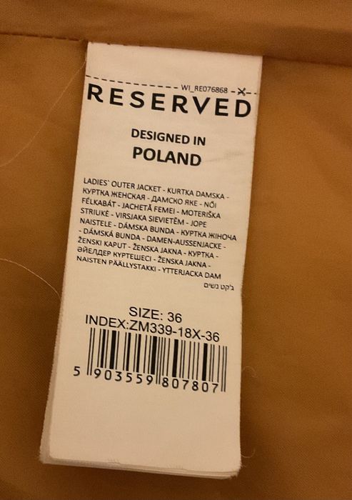 Damska zimowa kurtka żółta ocieplana Reserved