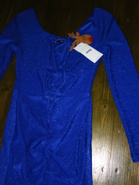 Блискуча мінісукня