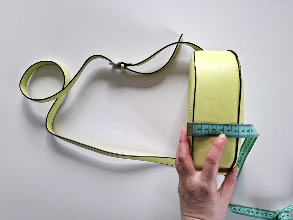 Kompaktowa torebka w odcieniu jasnej zieleni/ żółci