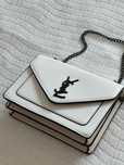 Mochila ysl mulher
