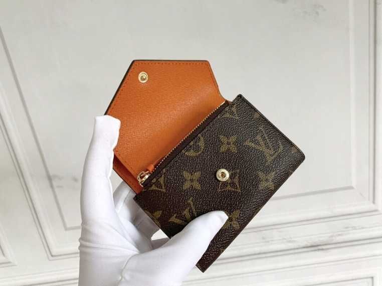 LOUIS VUITTON Victorine Klamra pomarańczowa