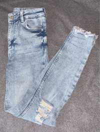 skinny jeans z dziurami bershka